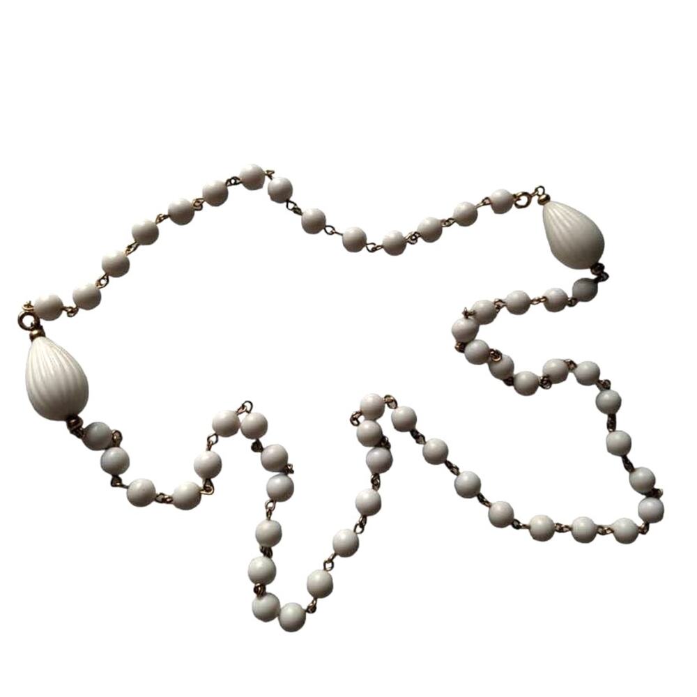 Vintage white plastic and gold tone necklace